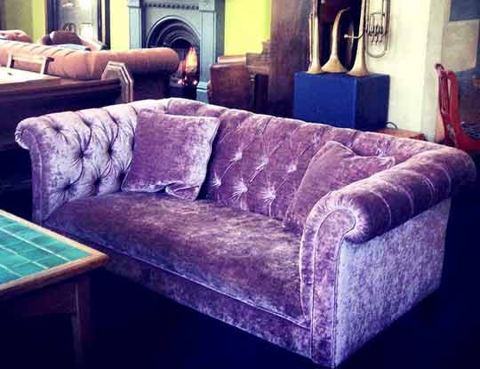 large purple velvet sofa