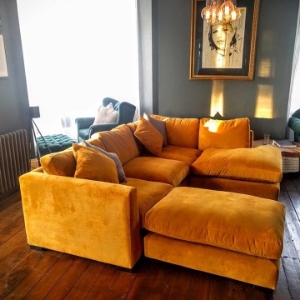 Shop Our Edit: Wadenhoe Corner Unit & FootstoolOrange velvet corner sofa in Warwick Plush Velvet Turmeric