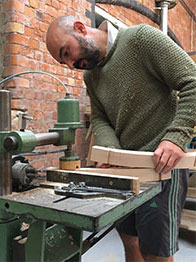 Man making furniture handmade in Britian