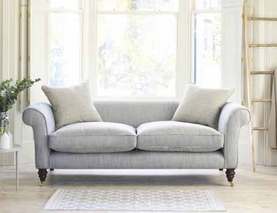 2 seater neutral sofa in living room